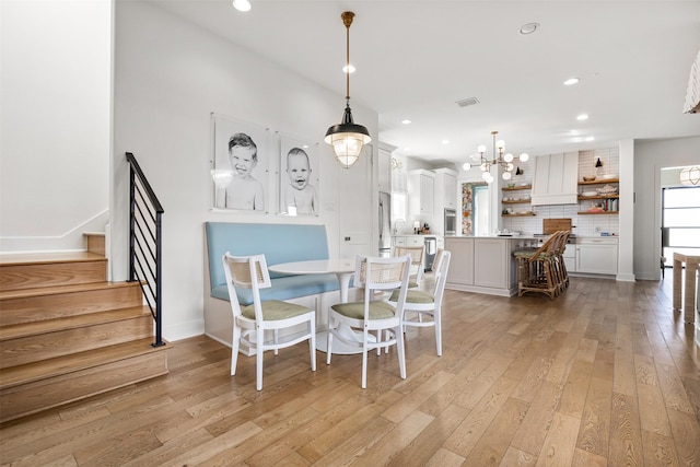 dining space featuring light hardwood / wood-style flooring