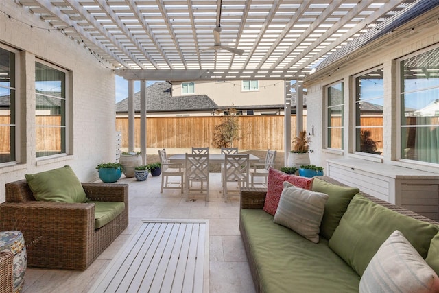 view of patio featuring an outdoor living space and a pergola