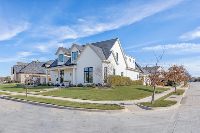 view of front of home featuring a front yard