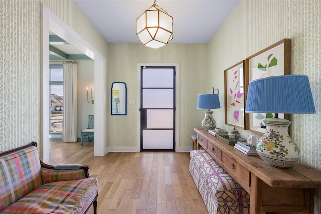 entryway with light hardwood / wood-style floors