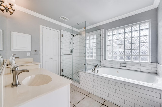 bathroom with a shower with shower door, vanity, tile patterned flooring, and ornamental molding