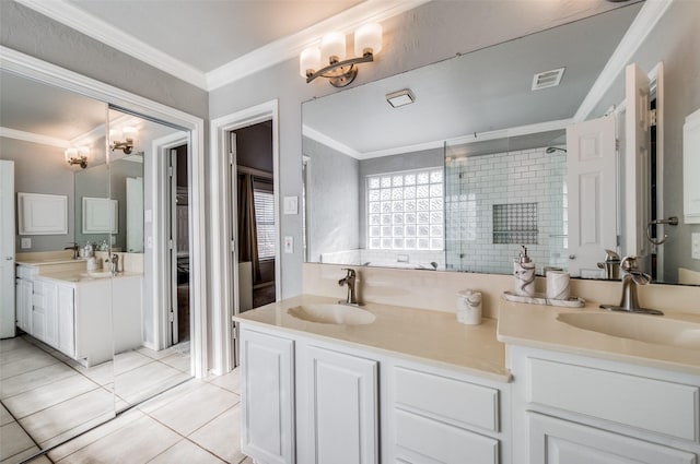 bathroom with vanity, a shower with door, a chandelier, and tile patterned flooring