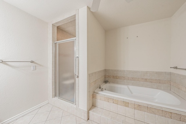 bathroom with tile patterned floors, a textured ceiling, and plus walk in shower