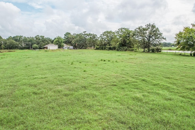 view of yard featuring a rural view