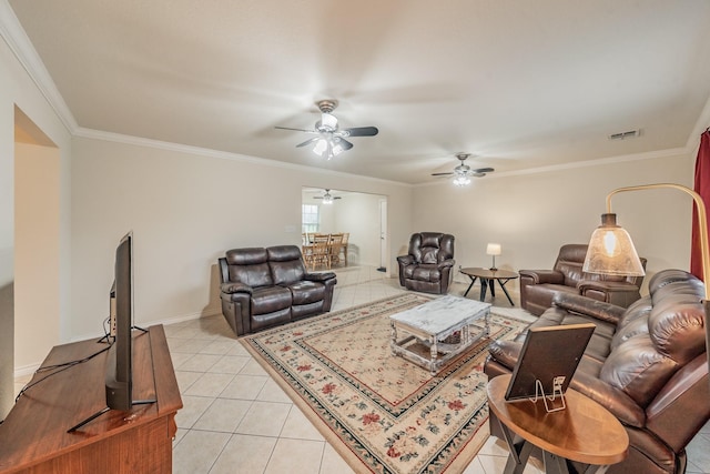 living room featuring crown molding and light tile patterned floors