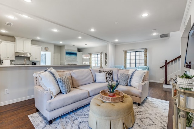 living room featuring dark hardwood / wood-style floors