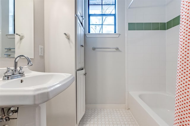 bathroom featuring sink and shower / bath combination