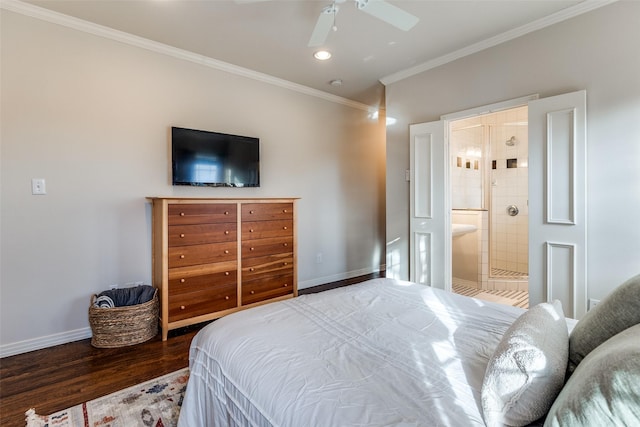 bedroom featuring ceiling fan, dark hardwood / wood-style flooring, connected bathroom, and ornamental molding