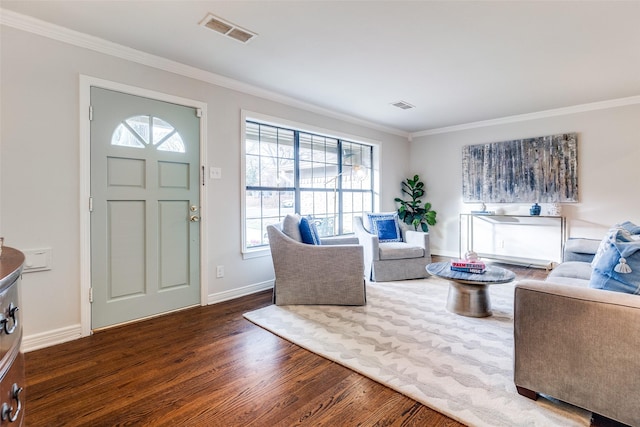 living room with ornamental molding and dark wood-type flooring