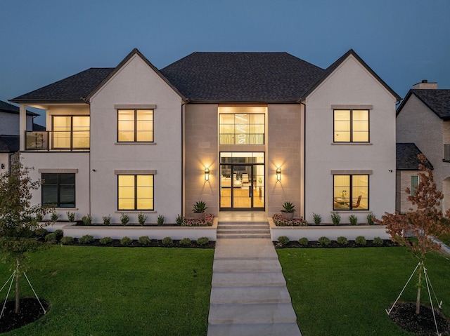 view of front facade featuring a front yard