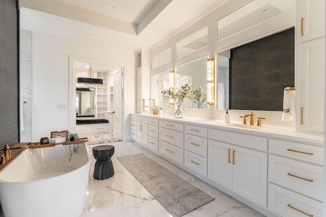 bathroom featuring a tub and vanity