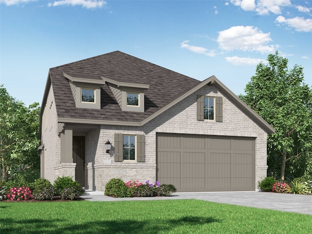 view of front of house with a front lawn and a garage