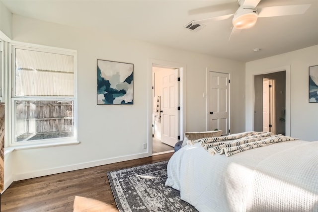 bedroom featuring ceiling fan and dark hardwood / wood-style floors