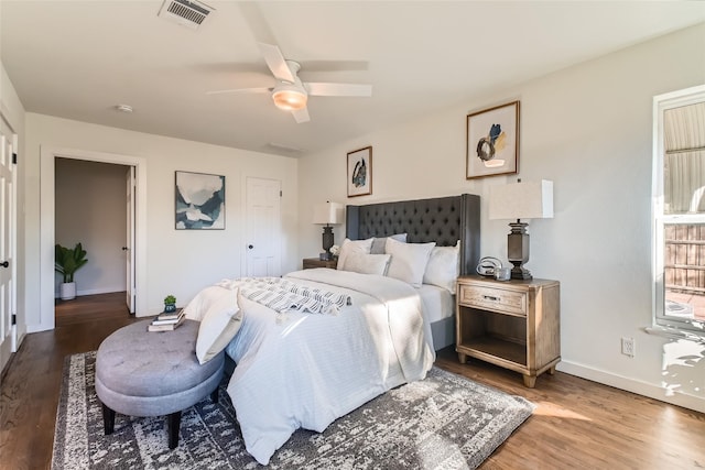 bedroom featuring wood-type flooring and ceiling fan