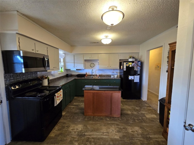 kitchen with a textured ceiling, black appliances, and sink