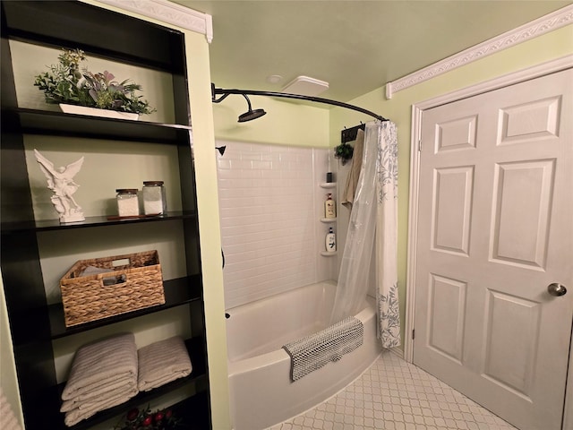 bathroom featuring tile patterned flooring and shower / bath combination with curtain