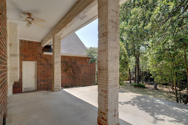 view of patio featuring ceiling fan