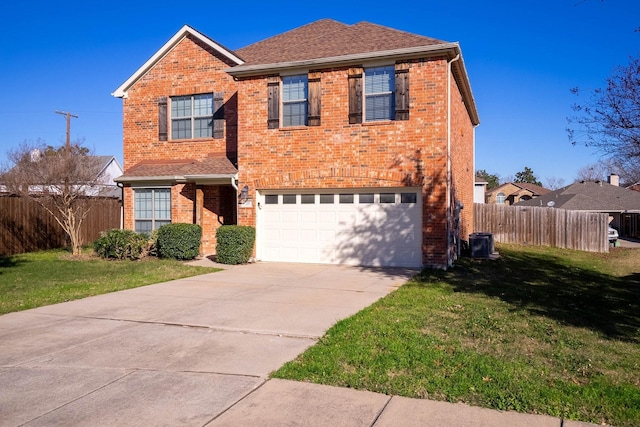 front facade with a front yard and a garage