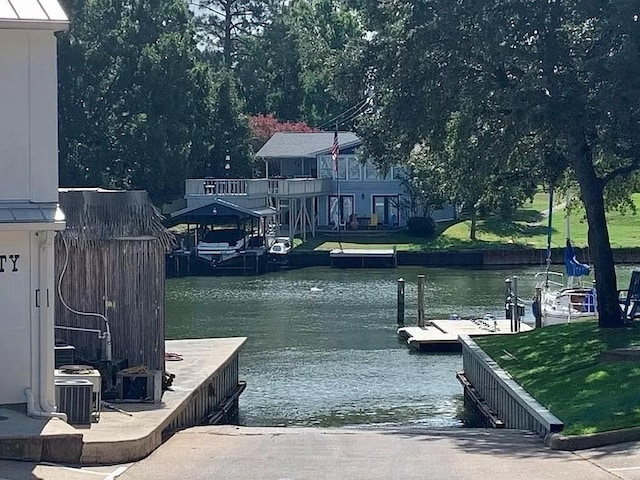 dock area with a water view