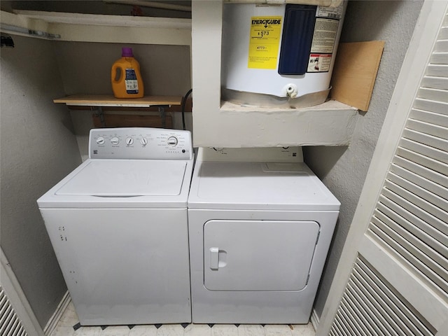 washroom featuring separate washer and dryer