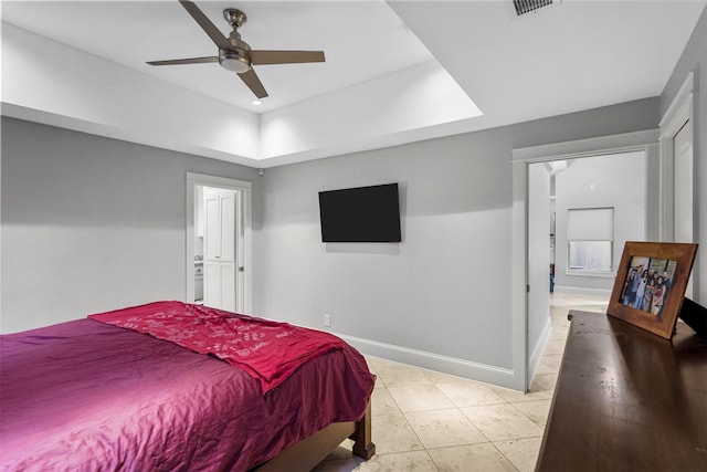 tiled bedroom with ceiling fan