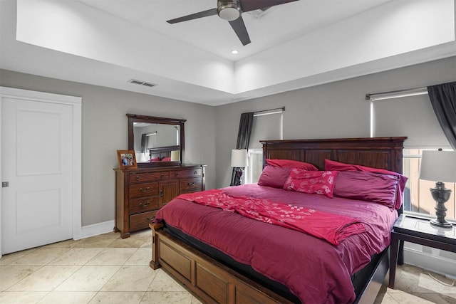 tiled bedroom with ceiling fan