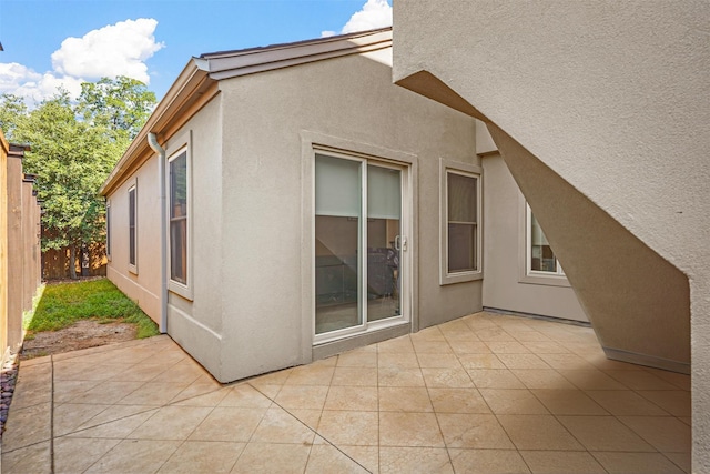 view of home's exterior featuring a patio