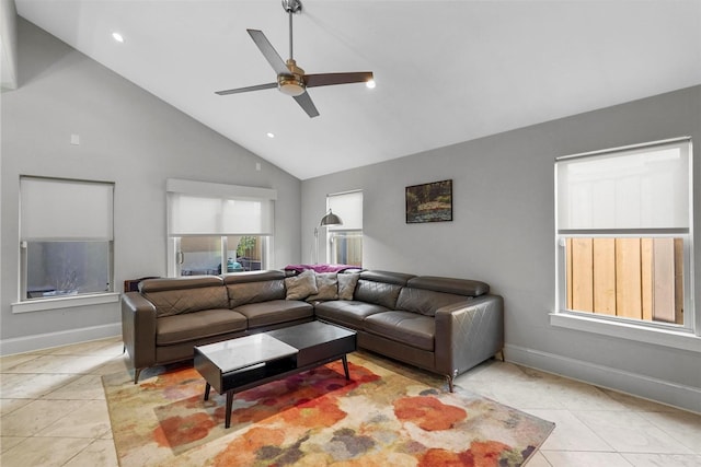 living room featuring high vaulted ceiling, ceiling fan, and light tile patterned floors