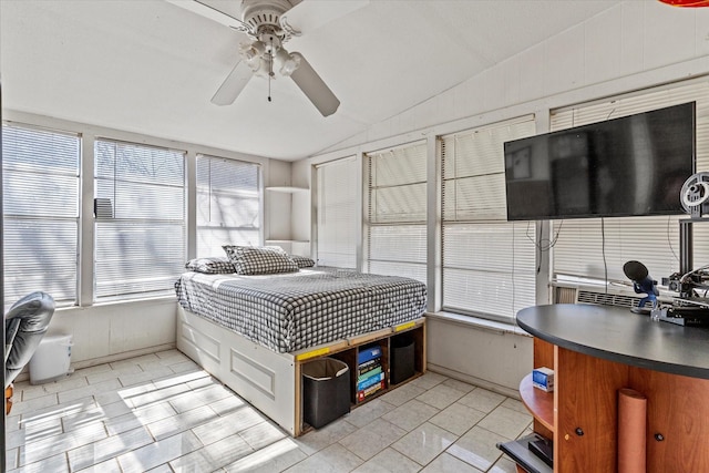 tiled bedroom featuring vaulted ceiling and ceiling fan