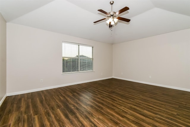 unfurnished room featuring lofted ceiling, ceiling fan, and dark hardwood / wood-style floors