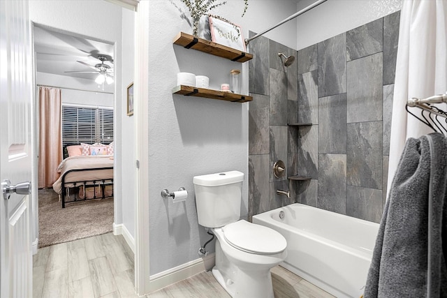 bathroom with toilet, shower / bathtub combination with curtain, and ceiling fan