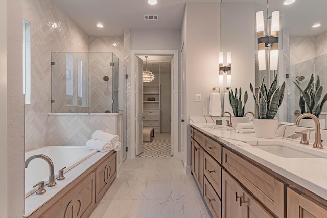 bathroom featuring plus walk in shower and vanity