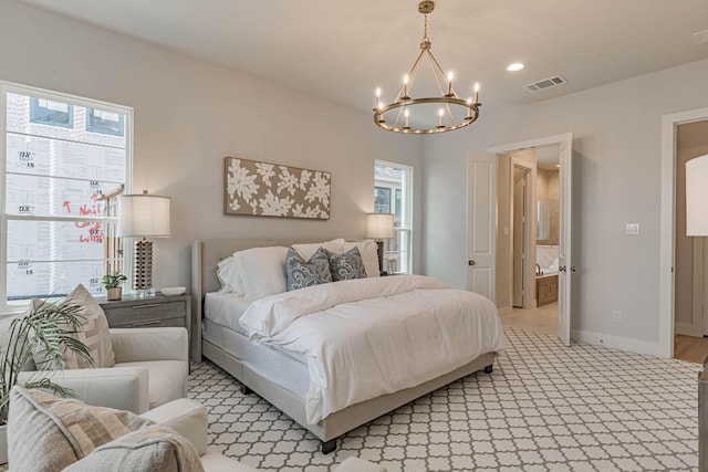 bedroom with a notable chandelier and multiple windows