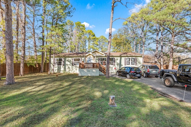 ranch-style house with a front yard