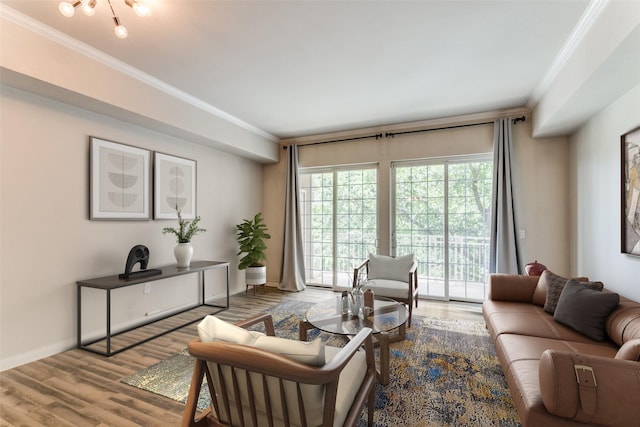 living room featuring ornamental molding and hardwood / wood-style floors