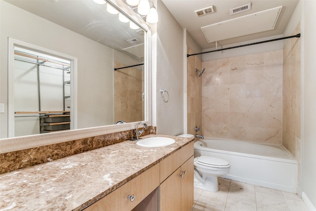 full bathroom with toilet, tiled shower / bath, and vanity