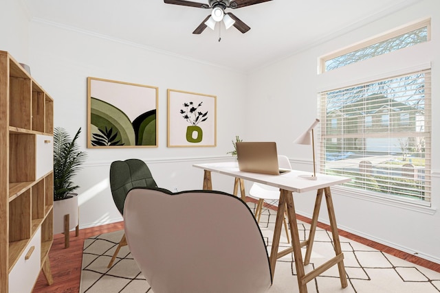 office space with ceiling fan, crown molding, light hardwood / wood-style flooring, and a wealth of natural light