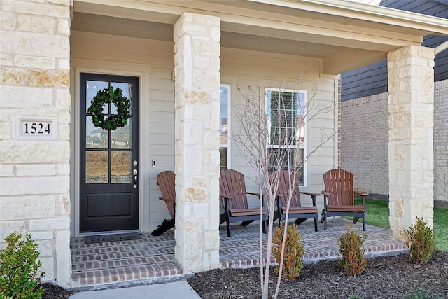 entrance to property with covered porch