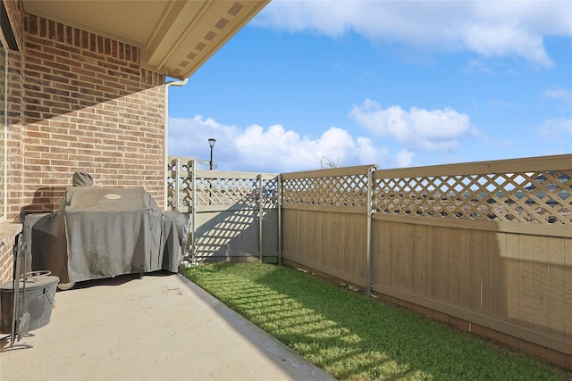 view of patio / terrace with a grill