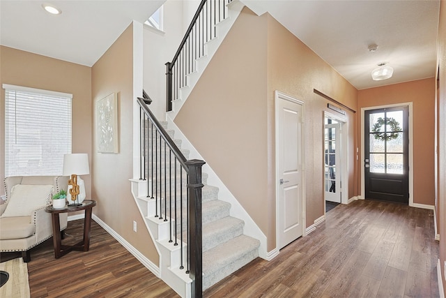 foyer entrance featuring dark hardwood / wood-style flooring