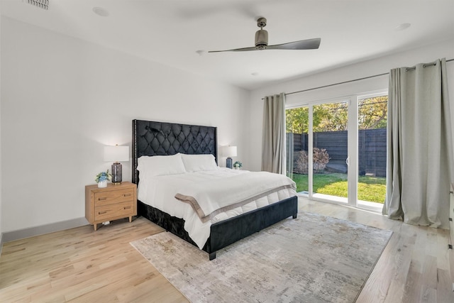 bedroom featuring ceiling fan and light hardwood / wood-style flooring