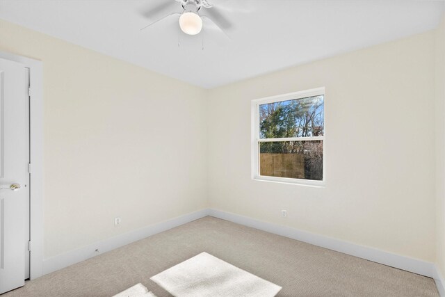 3506 Mcdonald Way, Garland, TX 75041 - carpeted spare room featuring baseboards and a ceiling fan