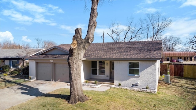 3506 Mcdonald Way, Garland, TX 75041 - view of front of house with an attached garage, roof with shingles, concrete driveway, brick siding, and central AC unit