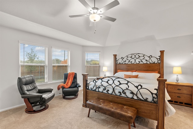 bedroom with a ceiling fan, carpet, lofted ceiling, and baseboards