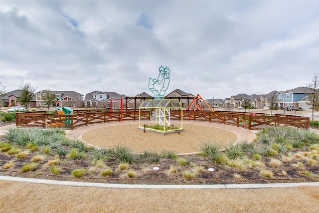 community jungle gym featuring a residential view