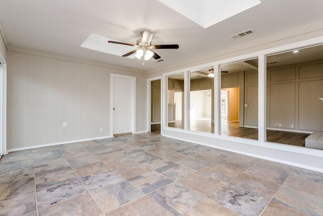 spare room featuring ceiling fan