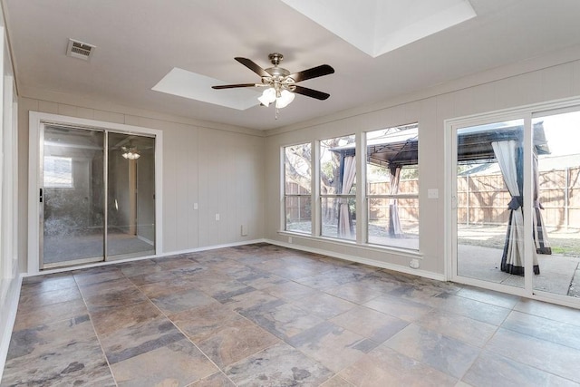 unfurnished room with ceiling fan