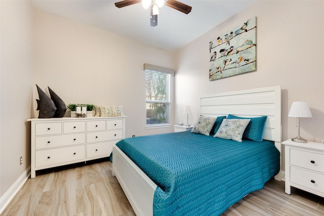 bedroom featuring ceiling fan and light wood-type flooring