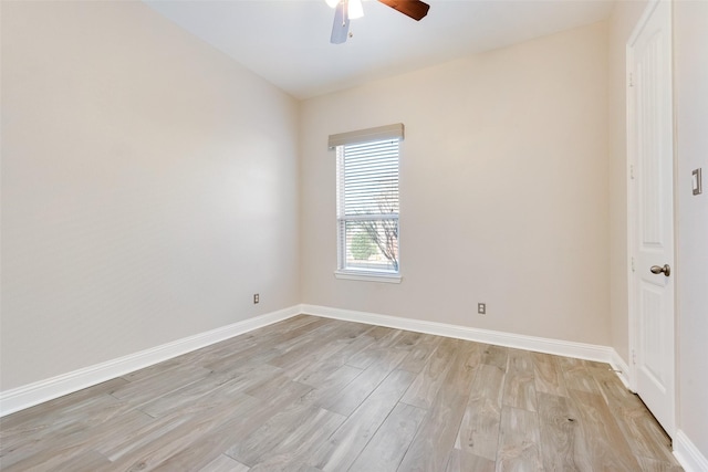 spare room with ceiling fan and light hardwood / wood-style flooring