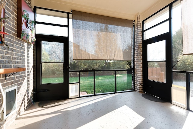 sunroom / solarium featuring a wealth of natural light